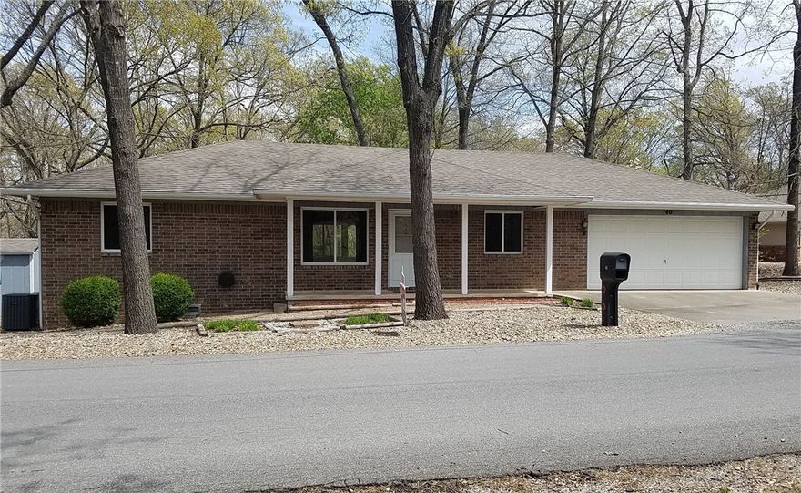 This charming three-bedroom, two-bathroom residence features a split floor plan, a two-car attached garage, an enclosed sun room, and a generously sized lot. Conveniently located near Huntley Gravity Park, shopping, and dining. The property boasts an eat-in kitchen and a separate dining area. The slightly sloped backyard offers a view of wooded common areas, a storage shed with electricity, ideal for a workshop. Available for immediate occupancy.