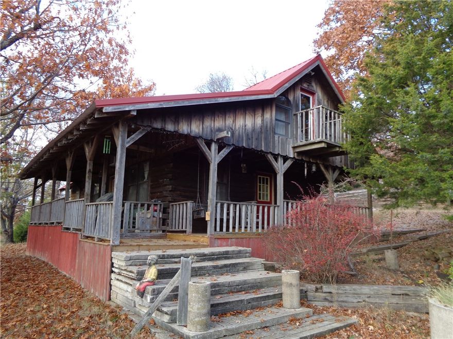 Beautiful cabin sitting on 380 acres in Madison County!  200 acres of pasture, 15+ ponds, and an additional.  Approximately a mile of Thomas creek running thru property!  Fenced and cross fenced, waiting to run cattle with approximately 180 acres of timber for privacy or to clear out for more pasture or to sell.  45 minutes to Fayetteville or 35 minutes to Huntsville so complete privacy but easily accessed.