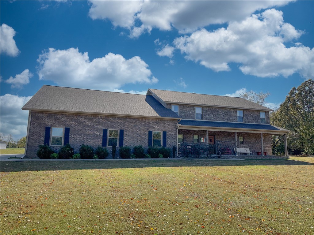 Gorgeous 3330 SF custom home on 5 AC in great location. 5 BR, 3 full BA & half BA. Primary BR downstairs w/access to large covered back patio. Features walk-in closet w/shelves. Primary BA has walk-in shower w/double shower heads, seating area, double vanities. Open plan in kitchen/living area, sliding door overlooks patio & wood burning stove on custom brick work. Kitchen has granite countertops, custom cabinetry, pantry, 5-burner gas stove, double ovens, 2 sink disposals, huge 5x11 island w/cabinets on both sides. Laundry area w/custom built-in mud bench. 4 BR upstairs w/2 jack & jill BA, walk-in closets w/bonus area. Storage in attic & under the stairs. Sprawling 2100 SF 3 car garage, 10x10 doors & 4th door for toys/equip. Garage has wood burning stove, additional full BA (unfinished shower). 2400 SF detached shop w/RV access & 750 SF, 1 BR fully equipped apartment. 50x200 dog run. Too much to list, see attachment.