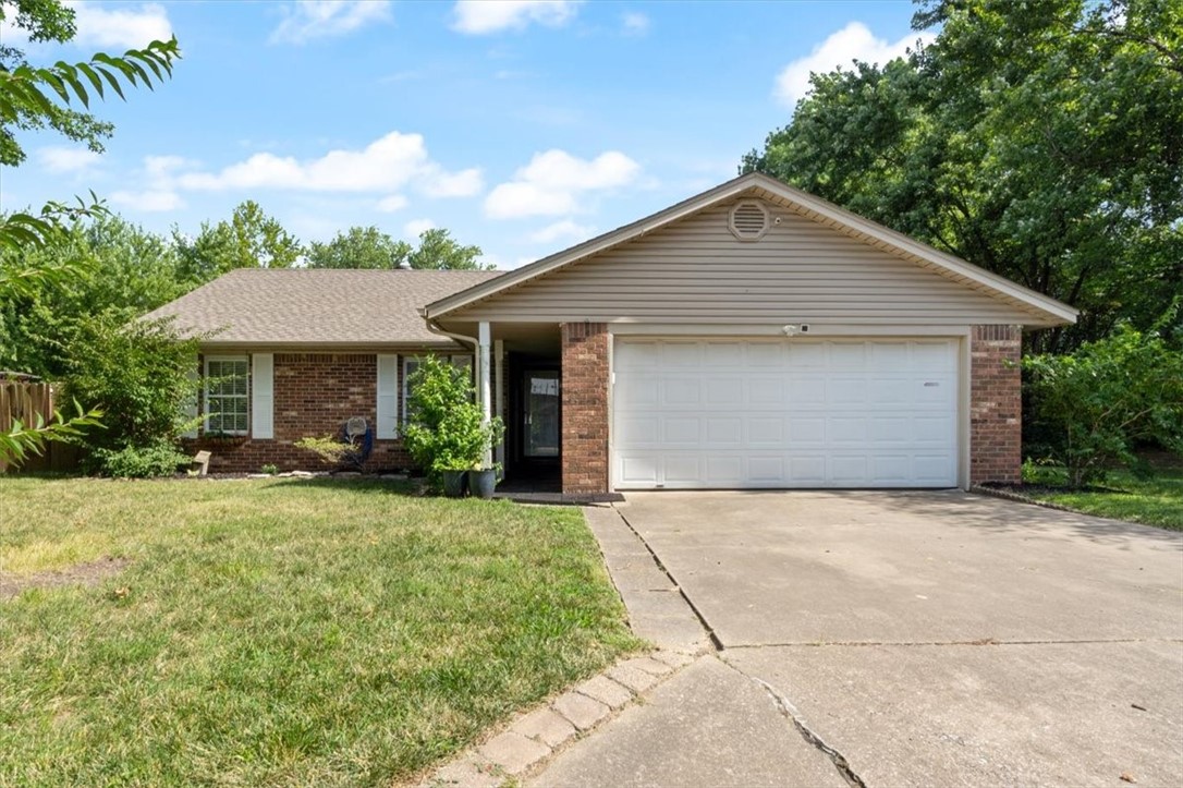You'll find this charming house tucked away on a quiet street at the end of the cul de sac. There's a large living area with a wood-burning stove, a walk-through kitchen with dining area and a nice-sized master bedroom and newly-remodeled walk-in shower. The 12x15 sunroom (not included in square footage) is a great bonus space for hobbies or just lounging in the sunlight. If you want to be outside, the yard is level and spacious, perfect for a playset or trampoline. And easy access through the double gate! The location nearby to schools, shopping, and 71B allows you to live, work & play close to home! Six minute drive to Tyson Headquarters. ***Numerous updates - see attachment. Kitchen refrigerator, washer & dryer and shed to convey. TV mounts in living room do not convey. Listing agent related to seller.