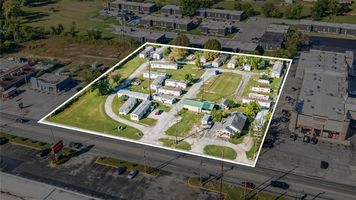 Active Income-Producing Mobile Home Park on 2.7 Prime Acres! Seize this incredible investment opportunity-an established mobile home park situated on 2.7 flat, high-visibility acres right along Highway 71B, one of the busiest corridors in Northwest Arkansas! This income-generating property includes 30 total slips with full city utilities, plus the original 1,245 SF homestead home-use it as an onsite management space or rent it out, and a 40x50 workshop-perfect for storage, maintenance, or additional income potential. Currently, only 10 slips are rented, leaving plenty of room to increase cash flow and maximize returns. With its prime location near downtown Rogers, I-49, and Beaver Lake, the possibilities for future development or increased rental income are virtually endless. Donāt miss out on this rare opportunity in one of the fastest-growing areas of Northwest Arkansas. Call today for details-motivated sellers are open to owner financing!