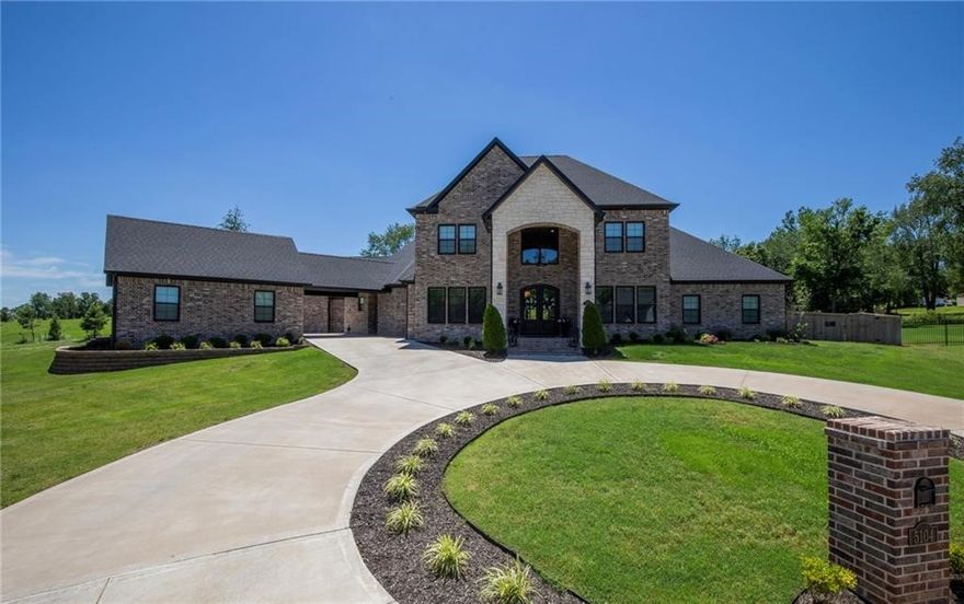 Executive living meets family comfort in this exceptional Haxton Estates retreat. Nestled on 1.12 private acres at the end of a cul-de-sac, this home offers the perfect balance of luxury and livability. After a short drive from the Walmart Home Office, unwind in your heated pool, host clients or friends on the covered patio with fireplace, or enjoy quiet evenings in the media room. The spacious layout includes a gourmet kitchen with quartz counters and custom cabinets, home office, media or game room, large family room, and flex spaces for work or study. The primary suite is a true escape with two walk-in closets, 4 person sauna, and private gym. Each bedroom has it's own private bathroom. Separate guest and pool houses offer privacy for visitors or live-in help. Zoned for top schools and close to Pinnacle and Shadow Valley—this home is made for modern executive families.