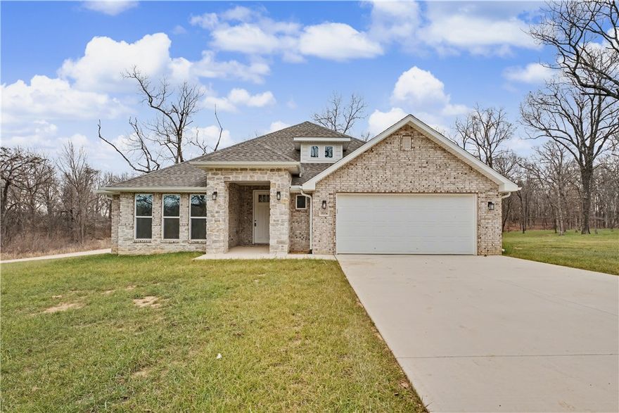 The 2575 floorplan features a 4 to 5 bedroom, 3-bathroom with over 2,500 square feet of living space. This premium floorplan is designed to elevate your living experience with its exceptional features and thoughtful design. Step into a home with impressive 15’ high vaulted ceilings, complemented by a stylish stained box beam, and 8’ tall front and back doors that enhance the home's elegance. The large window wall offers a picturesque view of the outdoors, leading to a vaulted covered back patio, perfect for relaxation and entertaining. Inside, custom built-ins beside the fireplace add both functionality and charm, while the pantry with deep shelves accommodates all your appliances and storage needs. The spacious laundry room includes a sink, making chores convenient and efficient. You have the flexibility to choose between a generous second master suite or a fifth bedroom to suit your family’s needs. Taxes subject to change based on new construction.