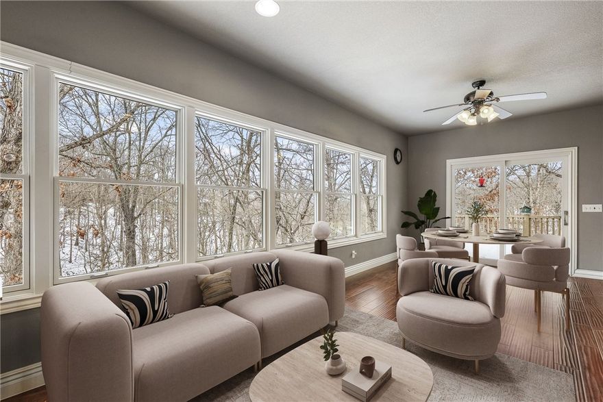 Tucked among mature trees on 1.28 acres, this OAK custom-built home invites a lifestyle of peace, purpose, & possibility. Morning coffee feels different in the sunroom—surrounded by treetop views that change w/the seasons—then spills out onto composite decking built for slow evenings & quiet reflection. Thoughtfully designed with 9’ ceilings, Pella metal-clad windows, geothermal heating/cooling, & instant hot water, the home blends comfort w/craftsmanship. New roof (summer ‘25) adds peace of mind. The heated & cooled 1,000+ sqft workshop is a dream come true—professional grade woodworking equip, high-ceilings, well lit, & accessible to the covered porch & paved drive, making this workshop a year-round attraction. The partially finished lower level offers an office, 1/2 bath, utility room, & flex space, w/the potential to add finished flooring to increase overall square footage & value. This is more than a home—it’s a place to create, unwind, & truly live. **Seller offering 7K in Concessions**  Home pre-inspected.