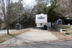 In the event you are looking for a tiny home setting on it's own land, look no more! This 5th wheel RV has it all including a great location near Table Rock Lake in the Cricket Creek RV Park. Short walk to lake. Boat slip may be available to new owner. Call Today!