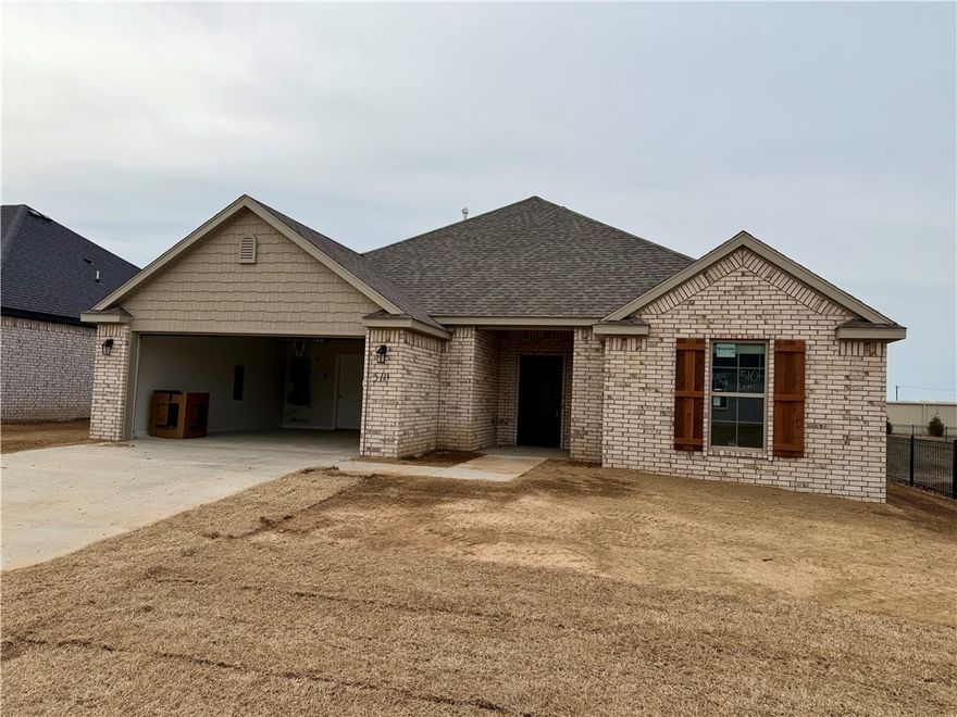 Modern design meets everyday comfort in this beautifully crafted one-story ranch nestled in a vibrant new community. Thoughtfully designed with 3 bedrooms, 2 bathrooms, and 1,669 square feet of well-planned living space, this home offers the perfect balance of style and functionality.

The open-concept layout effortlessly connects the kitchen, dining, and living areas—creating an inviting space ideal for gathering with family or entertaining guests. Natural flow and intentional design make every square foot feel purposeful from the moment you step inside.

The spacious primary suite serves as a private retreat, complete with a large walk-in closet and a spa-inspired en-suite bath featuring a soaking tub and separate walk-in shower. Two additional bedrooms offer flexibility for guests, a home office, or hobbies.

Step outside to the covered back porch—perfect for weekend barbecues, relaxing evenings, or enjoying time with pets and family. A finished two-car garage adds convenience and extra storage.