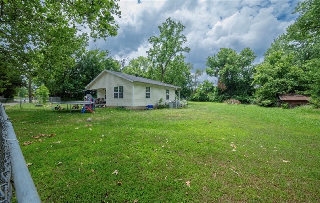 Welcome investors! This 2/1 home is conveniently located a mile from downtown Rogers and 2.5 miles to Lake Atalanta. Situated on a spacious .6 acre lot with a ton of potential. With a little sweat equity this home would make a great flip, rental or airbnb.