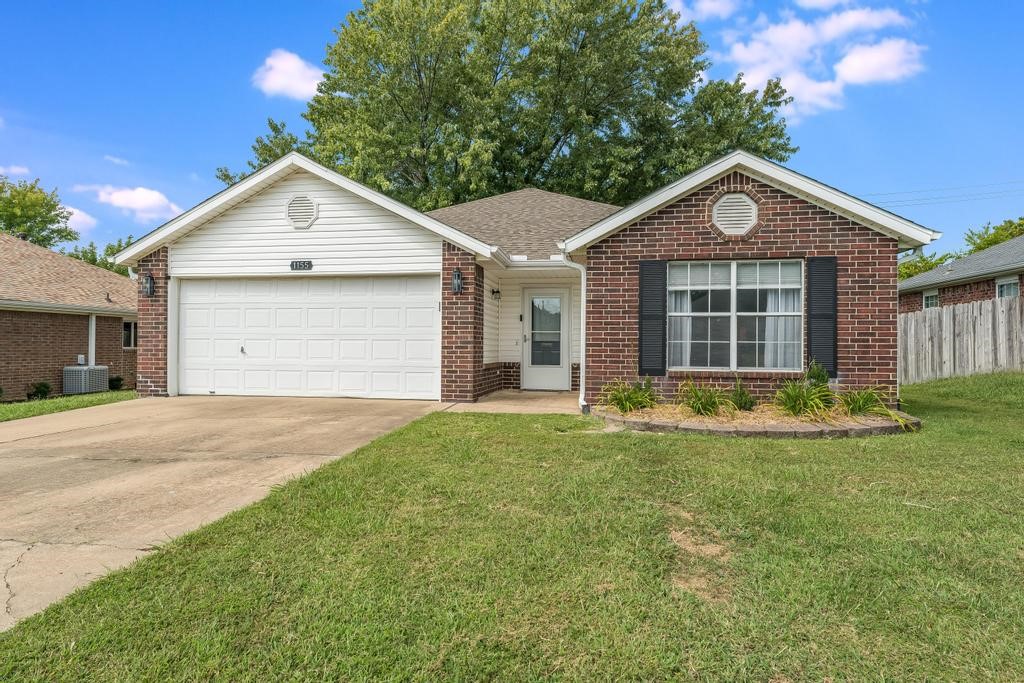 Welcome to this charming home nestled in the desirable Magnolia Crossing subdivision of Fayetteville perfectly situated off of MLK with easy access to I-49 and only 2 miles to University of Arkansas. With its spacious split floorplan layout, 2 car garage, modern amenities, and convenient location, this property is an ideal place to call home. As you step inside, you'll be greeted by an inviting foyer that leads into the living area with a gas fireplace. The kitchen features quartz countertops, stainless steel appliances & convenient access to the laundry space. The primary suite includes two walk-in closets, linen closet, walk-in shower and vanity. Relax on the swing or the patio in the back yard surrounded with wood privacy fence. Many updates include: new roof (2020), new gutters & guards (2023), $20K in foundation repairs 2024 (transferable warranty), garage door opener & storm door (2025), newer quartz countertops in kitchen & bathrooms, HVAC (2018), newer tankless hot water heater.