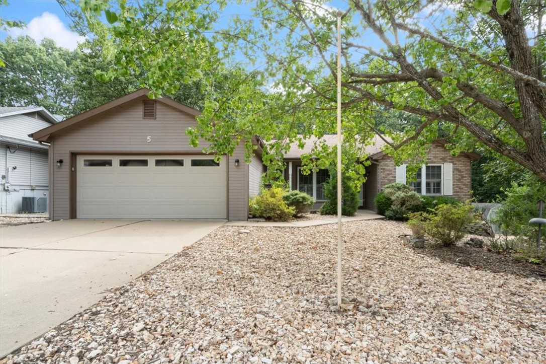 Just 1/2 mile to the Beach at Lake Avalon and trail access! This is a solid house with a great floor plan. Kitchen has Corian counters and an abundance of storage between the cabinetry and large pantry closet. Split floor plan with primary suite having a walk in closet and ensuite bath with walk in shower. Two additional bedrooms and hall bath. Screened porch overlooking a level back yard and deck for your grill. Great level yard that is fully rocked for low maintenance. Two car garage. Crawl space storage. Location would be great for an investment property for short term rental with close access to the Beach at Lake Avalon and trails. Price point would make this home a great opportunity for a first time buyer! Just needs a little cosmetic TLC! Two bedroom septic.