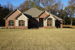 Gorgeous 3 Bdrm/2 Bath all Brick And Stone Home! Beautiful Stamped Concrete Floors and Elegant Crown Molding. Features an Office/Study just off the Living Room. Master Bdrm.has a HUGE Walk-in Closet that wraps all the way around the Whirlpool in the Master Bath , Large Laundry Room. Covered Back Patio And So Much More!!