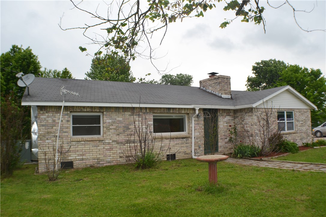 Pick fruit from your own back yard! This darling 3 bedroom 2 bath home has had a complete renovation in 2012. NEW drywall on walls, NEW 200 amp electric service, all NEW wiring, all NEW water lines, NEW cabinets & counter tops, NEW heat and air system. The home features split floor plan, formal dining, a wood burning fireplace, double sinks in master bath, the master bedroom has a separate entrance, numerous wonderful producing fruit trees in the back yard with its own adorable gardening shed.