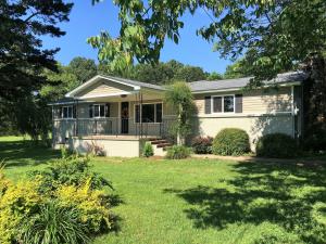 Country home on 2.16 acres in Hector school district. Newly remodeled with over 1300sqft of quality updates. Rock wall with wood-burning fireplace.