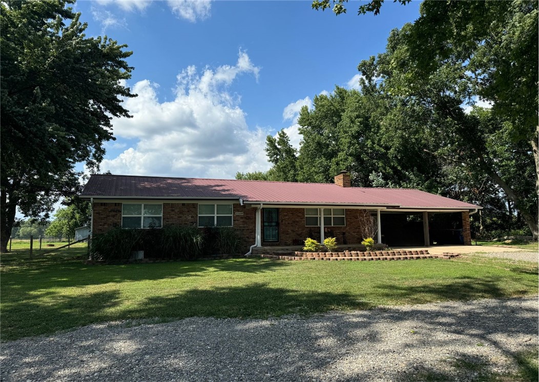 Nestled on a sprawling 10-acre lot, this timeless 4-bedroom, 2-bathroom home, offers a tranquil retreat. The classic design exudes charm with its welcoming front porch and cozy living space. The owner's ensuite is newly remodeled with a large walk-in shower. The expansive 10-acres of land offers many possibilities for outdoor living, recreation, and animals. This home also comes with a large barn and storage building. Homeowners just recently replaced the HVAC systema and encapsulated the crawl space.
