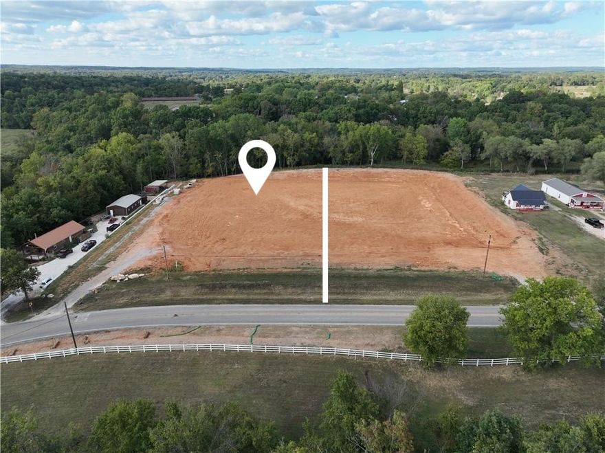 Unlock the potential of this prime 1.94-acre commercial lot with excellent road frontage in the growing community of Pea Ridge. This property offers a unique opportunity to establish your own business in a growing area, complete with essential utilities including public water, gas, electric, & sewer. Located just minutes from local amenities such as Walmart Neighborhood Market, Pea Ridge City Park, & Big Sugar Golf Club, this lot provides convenient access for customers & clients. Its strategic location ensures high visibility & traffic, making it an ideal site for retail, service, or office space. Zoned for multi family & has been conditionally approved for 40 townhomes. Also, approved for a RV/trailer storage facility with approved engineered plans by the city. Don’t miss out on this opportunity to invest in a rapidly developing area. Make your mark in Pea Ridge today!