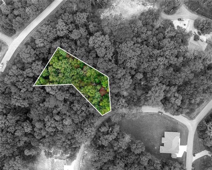 Over half an acre lot to build your dream home on! This property has a recent perc test, land perced for up to a 5 bedroom. Perc test results are available for the buyer. This lot is just minutes from Highlands Golf + Pub and the Branchwood Recreation Center/Branchwood Nature Trail. A quick drive to the Bella Vista bypass to head into Bentonville. The lot backs up to Bella Vista POA property for added peace and quiet. Come build your dream home on Newburgh Drive!