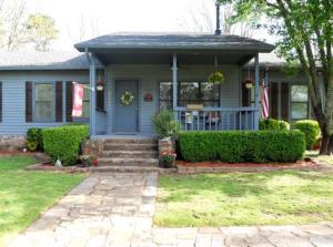 Privacy & paved road! Only 6 miles from Russellville with easy access to I-40. Your massive deck will be perfect for entertaining, new privacy fence for the pets, big front yard for the Kids, 4 car garage for Dad, Extra Spacious Master for Mom with whirlpool tub, separate shower, walk in closet and double sinks. Real wood flooring in living room. Storage building and R.V. parking. Almost 3 acres
