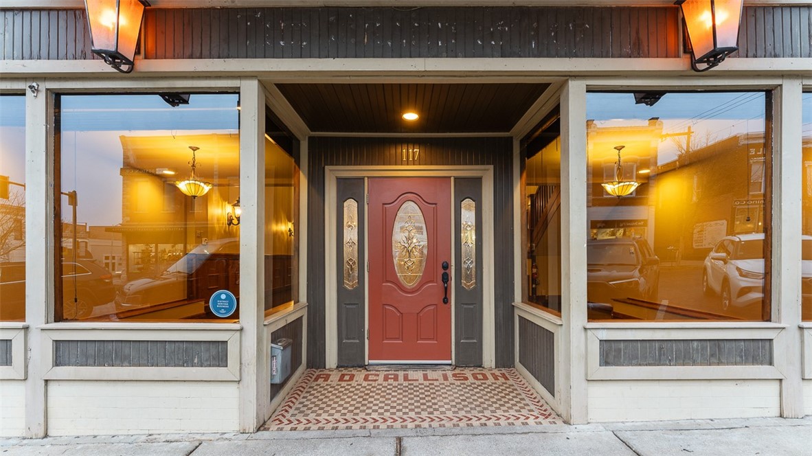 Located in Rogers Entertainment District - Offers a unique and engaging atmosphere walkable to outdoor gatherings, concerts and shopping. Originally a local favorite farm & supply store & several businesses offering services such as doctor offices, funeral home, hardware & automotive, restaurants, and event venues most prominently The Grand at 117. When visiting - Park on the brick streets, enter through the old-time storefront, a great room w/ high ceiling, iron chandeliers, views of the grand staircases & mezzanine balcony overlooking the venue. As a restaurant, it has a full-size commercial kitchen, hood vent system, 2 walk-in coolers & a Glycol tap system for the first & second-floor bars. Add'l storage in full-height basement. Newer HVAC & new roof 2024. Ambient outdoor patio seating. Add'l municipal parking behind the building with Rogers' alley lightscapes. Adjacent to Experimental House and near Railyard Park, Butterfield Stage, APT Theater and other popular shops and eateries. Zoning T5.2, Phase 3 power