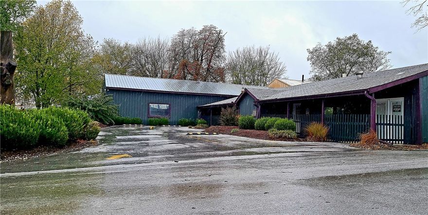 Want to end the year with a great investment property? Here's your chance with over 35 covered RV storage, 120 uncovered, 30 boat/misc spaces and 20 roll up units with beautiful landscaping in front and extra shop building for whatever you can think of and so many more possibilities.  Highway frontage in an up coming town, Hiwasse is the place to be. This is 5+/- acres off of main parcel that will be split off after purchase.  Additional land with pond available. Contact agent for more details.