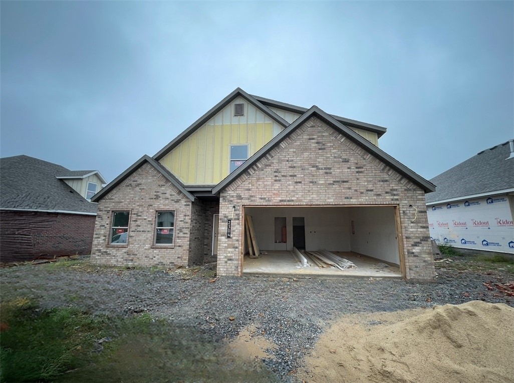 Beautiful New Construction Home in Heritage Ranch Subdivision! This 2,148 SF home has 4 bedrooms, spacious open living, abundant storage, and large covered patio. Foyer entry welcomes you in with garage access to the right and a guest bedroom and bathroom to the left. The living room boasts vaulted ceilings and a fireplace feature, along with great natural light. Gorgeous LVP flooring throughout the living areas. The kitchen is open to living and dining, perfect setup for everyday and entertaining. A massive pantry offers amazing storage space. Bright dining area with backyard views. The primary suite is a spacious and relaxing retreat with attached bath featuring a large shower, soaking tub, and WIC connecting to laundry. Upstairs are two guest bedrooms and guest bath. 2 car garage has extra storage closet. The covered patio is an excellent outdoor living space and enjoy your yard space. Located next to Schools, Aquatic Center, and Parks. Nearby John Brown University and historic Downtown Siloam Springs.