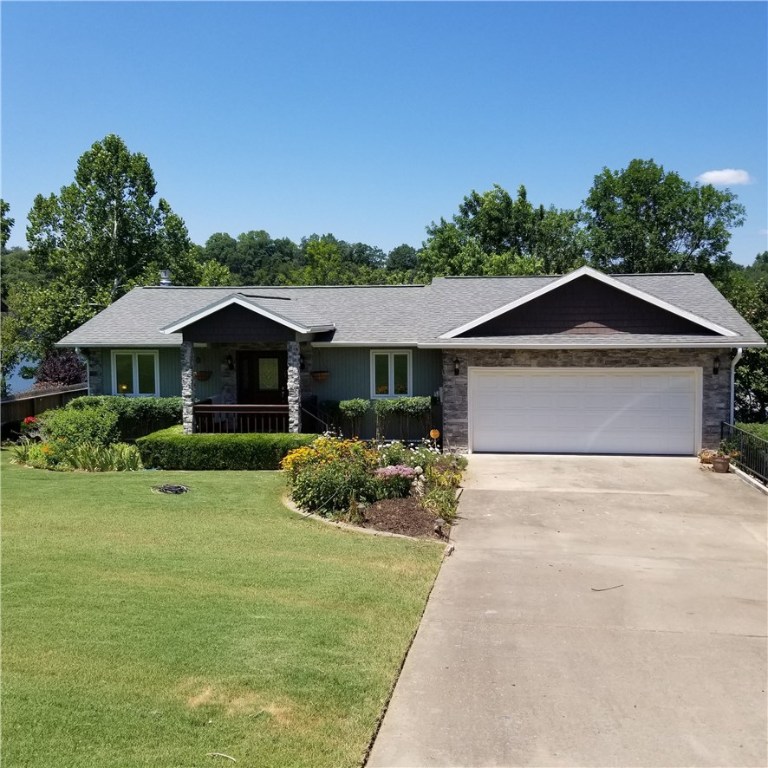 Stunning newly remodeled 3 bedroom 2 bath home on the lake! Great views from all rooms of the home, back patio overlooking the lake. Tenant will have access to boat dock on property (cannot store boat there). Security system, 2 car garage, beautiful landscaping. This is definitely a must see!!