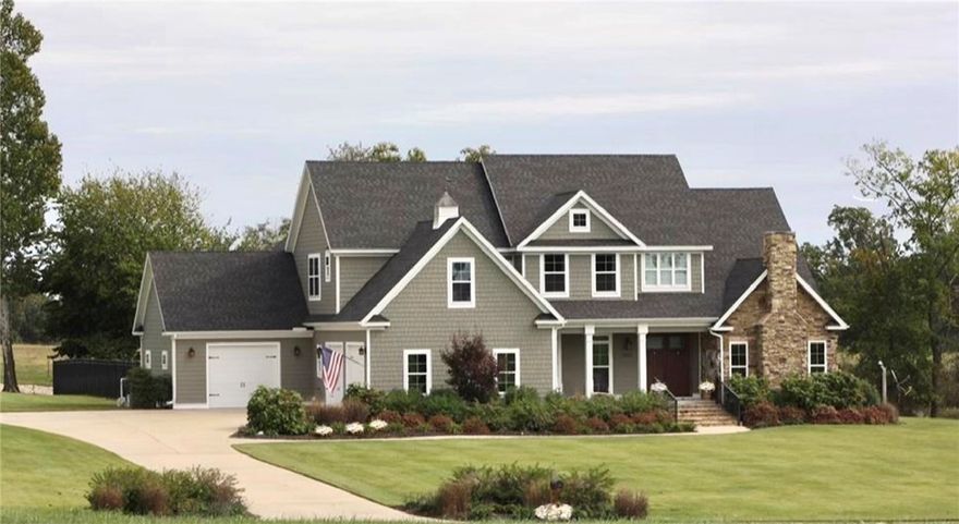 This beauty has always been a local favorite! This gorgeous home has the best of all worlds, own a little part of the country and still be close to town. Great location being 15 min to XNA and 20 min to Springdale. This meticulously well built home boasts customs inside and out. Listing is 2 spacious acres but there is an option for additional 1-15 acres. Additional acreage is behind/East of the home and is not in subdivision thus has no restrictions. Could be used for horses, there is an existing barn as an option, or space to put a shop. Estate has private backyard oasis with gunite pool, professional landscaping, and wrought iron fencing over-looking pasture lands.