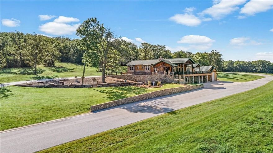 This estate is located Fayetteville, Arkansas, sitting at 165+/- acres, the possibilities are endless for this property! Whether for development, a wedding venue, race track, or your own private estate, this property has it all! With the LARGEST privately owned solar complex in Northwest Arkansas, this property showcases what Arkansas has to offer. Featuring a 7764 sq ft custom built home, 1.2-mile asphalt race track, 30K sq ft of shop buildings, 606 sq ft guest house, 4125 sq ft of outdoor patio space; this 165+/- acre property has something for everyone! For the second year in a row, Fayetteville was named one of the top five best places to live in America by U.S. News & World Report. Northwest Arkansas is home to world-class Crystal Bridges Museum of American Art; more than 200 miles of mountain biking and paved trails; the University of Arkansas; and headquarters for Walmart, Tyson Foods, & JB Hunt. This is an absolute amazing property!