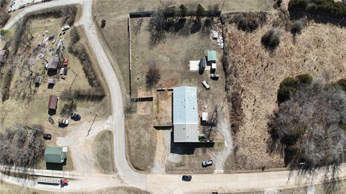 Approximately 5,000 Sq. Ft. of space zoned C-1 & C-2, located in Flippin, AR on a 1.37 acre m/l corner lot. (Fronts on Industrial Park & Crane St.) Would make a great single-family residence, with lots of amenities. Already plumbed with 6 half baths on lower level with 5 rooms and kitchen area, plus 2nd-story apartment with full bath and 3 additional rooms upstairs. Featuring a washroom with multiple washers and dryers as well as an on-demand natural gas hot water heater. At under $40 per sq. ft. this is an incredible opportunity for the savvy investor. Call for showing today!