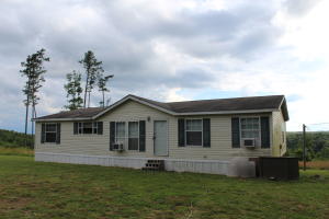 Breathtaking view for miles and miles from this 3 bedroom/2 bath home settled on 20 acres. Home features a wood burning fire place and a large master bath. Located only minutes to the Buffalo River. No well and no septic. This one won't last long!
