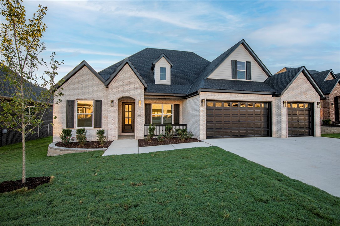 New Construction in SW Bentonville! The Anna Plan. Home features 4 bedrooms, 3.5 baths, study, Formal Dining and bonus room. Primary Bedroom on lower level and 3 bedroom plus bonus upstairs. Walking distance to Central Park Elementary School. Quality modern finishes. Upgraded amenities include 10' ceilings on 1st floor, 2-50 gallon water heaters w/ circulation pump, 6' soaker tub, cedar beams, ceiling high kitchen cabinets, covered outdoor patio with fireplace, center vac, & more. Great open plan - spacious kitchen with center island, double ovens, hooded vent, & custom cabinets. Living room and patio wired for sound. Welcome home to Clarendon Heights!