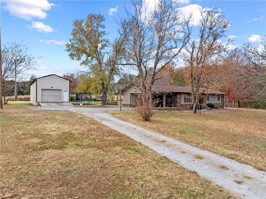 Set just outside Yellville this home is 30 minutes from Harrsion AR and Mountain Home AR. This 1,729 sqft home sitting on 2.02 acres delivers country appeal with practical amenities, including solar panels that will make utilities low! The kitchen was updated in 2021, along with a new septic system in 2023. The backyard includes a pergola, chicken coop ready for chickens, thirteen raised beds for a gardening area, and a great shop space (47ft x 14ft and 18ft to the rafters) perfect for work or hobbies. This is a move-in ready property with room to live, work, and enjoy the outdoors.