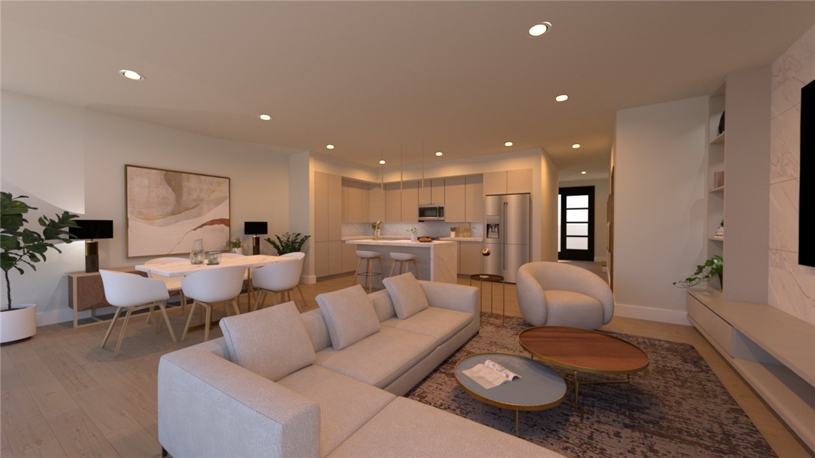 The townhomes at Parkside of Lowell showcase a modern aesthetic with thoughtfully designed open floor plans. Every unit features premium finishes, including quartz countertops, stainless steel appliances, and upscale luxury vinyl oak flooring. All-electric systems ensure energy-efficient heating and cooling for comfort and cost savings. Parkside combines contemporary design with an active lifestyle, with no restrictions on short-term rentals, making it a prime investment opportunity. Residents enjoy amenities like a clubhouse, gym, pool, and direct access to the Razorback Greenway for endless outdoor adventures. The community is centered around Kathleen Johnson Park, soon home to the NWA Space and Science Center, a soon to be major destination in NWA. The new flex space adds value with a mix of restaurants, businesses, and storage solutions for residents. As Lowell continues to grow in the NWA region, Parkside remains a standout community.