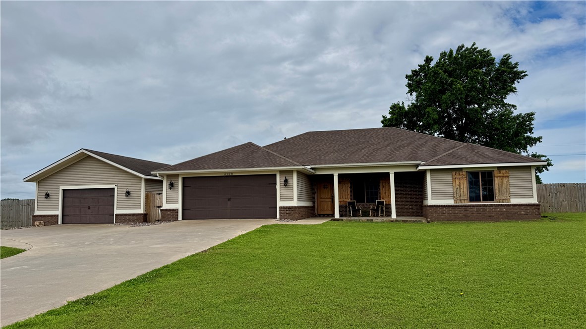 PHOTOS COMING! Welcome to (never been listed before) 6108 SW Lee Ln, at the end of a quiet cul-de-sac, this 4-bedroom, 2.5-bathroom home offers 1,748 square feet of living space designed for comfort and function. Located within the Bentonville city limits, it combines privacy with convenience.
Step into the backyard and discover the saltwater pool complete with a waterfall and tanning shelf—ideal for relaxing or entertaining. The 1,200 square foot shop offers generous space for storage, work, or hobbies. A barndominium apartment nestled in the backyard adds flexible guest or rental options.
The lot provides ample outdoor space with a peaceful atmosphere, perfect for both quiet living and activities. Solid build quality ensures long-term comfort and usability. Located on street with only 7 other homes, this property also offers quick access to Bentonville’s shopping, dining, parks, and schools.