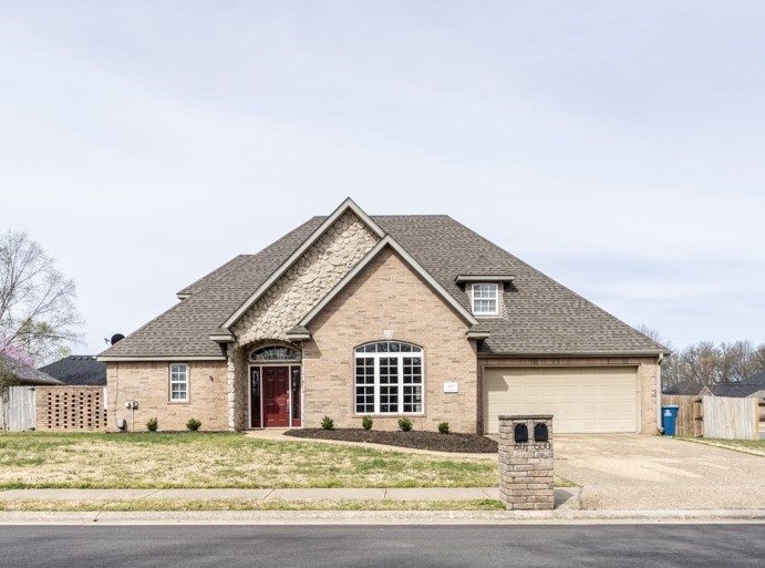 College Place Subdivision! 4 bed 2.5 bath home situated on large corner lot. Super location! Close to trails, eateries, I49 and the new Walmart campus. Hearth room, formal living area, built ins throughout. Laundry room with sink and storage. 2nd level has 3 large bedrooms and full bath with dual vanities. Master suite is on main level with dual vanities, jacuzzi, & standalone shower. You will love the floor plan and design of this home. Lots of natural light. All adult occupants must complete application. $50/person to apply. Pets considered with additional deposit.