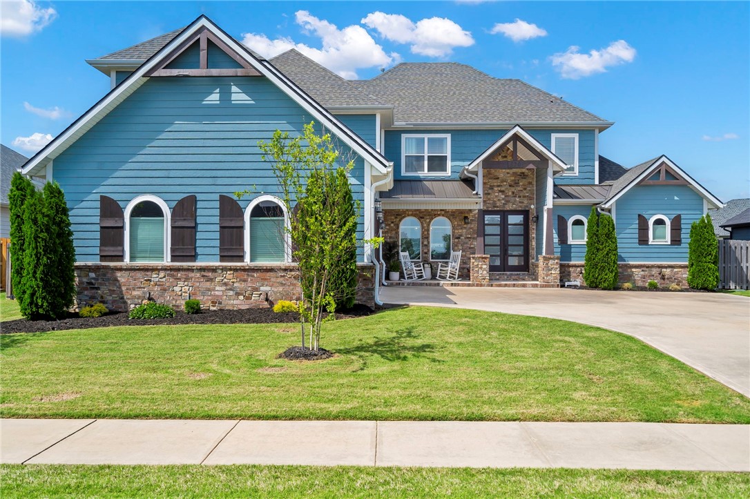 Welcome to this incredible 4141sq ft 2-level contemporary home! As you enter through the 8ft double doors, you can feel the spaciousness of the living room with 20-foot ceilings. In the bright & airy kitchen you will notice a 9”x 4.6” island with storage, touchless faucet, pot filler, gas cooktop, built-in microwave, double oven & walk-in pantry. The primary bedroom has a door to the backyard & large walk-in closet with plenty of space for the residents' clothing. The primary bathroom boasts a walk-in shower with 3 showerheads, dual sinks with two separate linen closets & whirlpool tub. Downstairs there are 2 more bedrooms one with a large WIC. They share a Jack n Jill bath each with its own sink. There is also a 1/2 bath in the hallway for your guests. Upstairs you will find 1 bedroom with a huge WIC, a bonus living area & media room. Beautiful quartz countertops throughout. Laundry room is downstairs with a built-in sink and cabinets. Spray foam insulation & radiant barrier for utility cost savings.