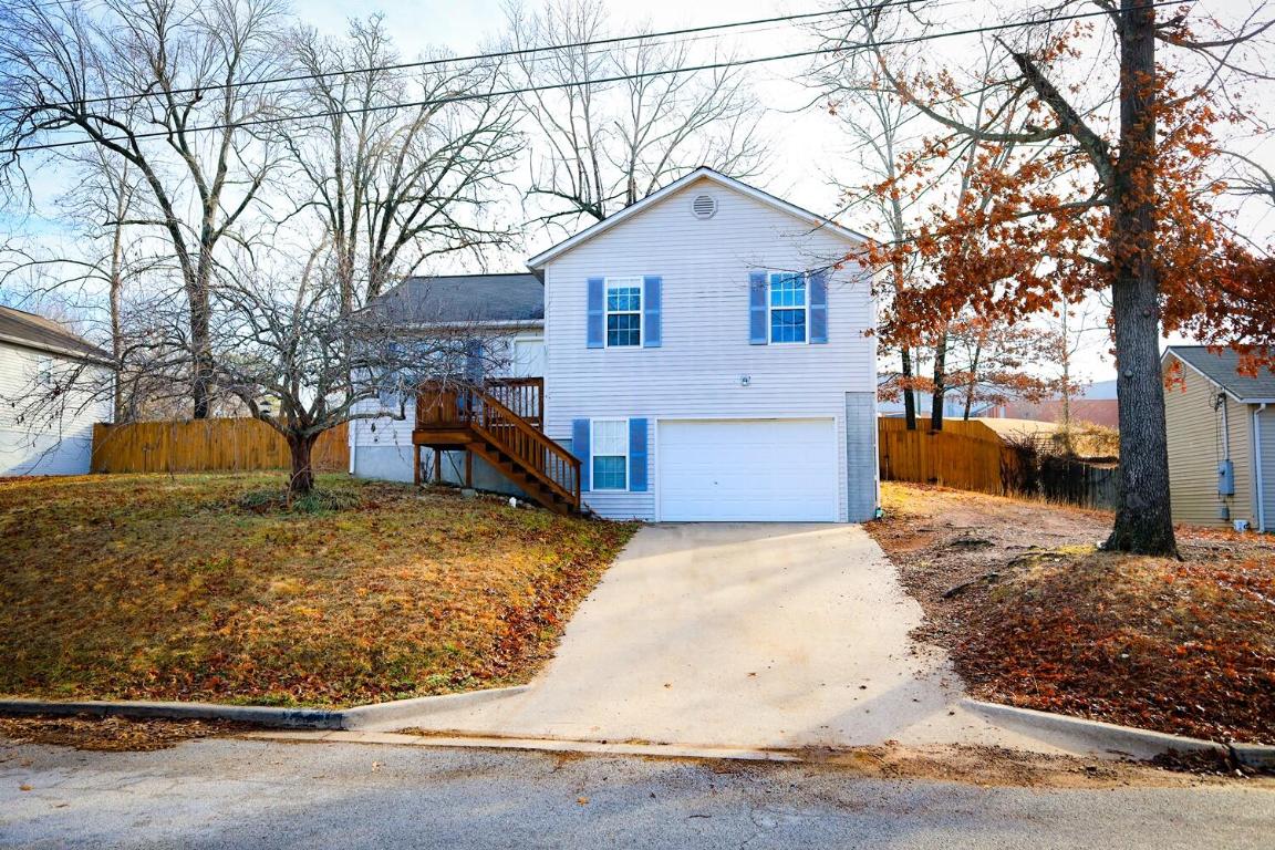 Step into Style! Discover the Charm of this 3 Bed, 2 Bath Gem with an Open Floor Plan, Elegant Vaulted Ceilings, and a Dreamy Updated Kitchen featuring Granite Countertops. Laminate Luxe, Attached Garage, and a Back Deck Retreat! Your Next Chapter Begins Here - Ideal for First-Timers or Those Moving Up!