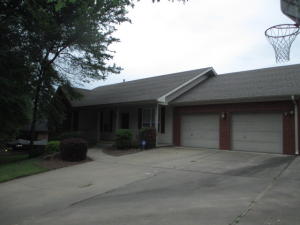 3 Bedroom 2 Bath Brick home near the lake! 1808 sq.ft with additional 75 sq.ft in workshop/storage attached to the 2 car garage. High ceilings with crown molding, security system, new stainless steel appliances, new flooring, large front porch and back deck, gas fireplace, AND owner has provided 1 year home warranty! Move in ready...you don't want to miss this!