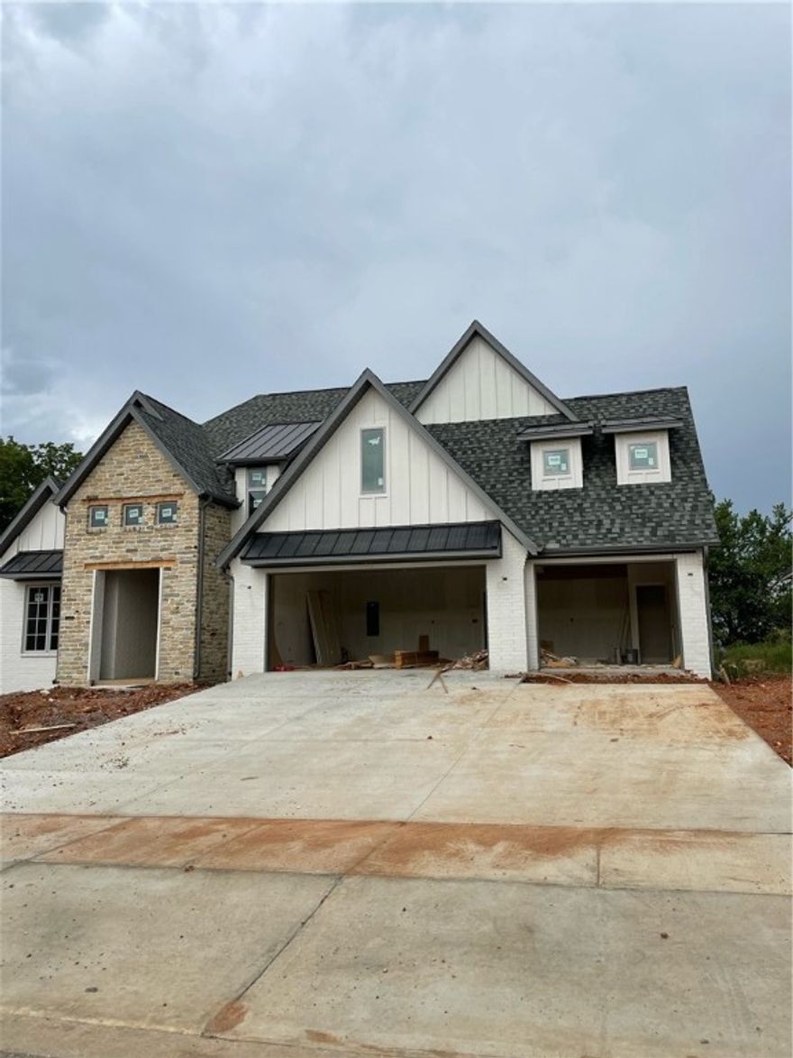 Truly a gem in west Bentonville, just 3.5 miles to the Square. Beautiful new construction with spacious, open floor plan. Wired for sound. Large granite island, plenty of counter space, and walk-in pantry storage. Master suite with a soaking tub, and a big walk in closet connected to laundry/mud room. Second bedroom and full bath also on main level. Upstairs features bedrooms three and four and large bonus room. Three car garage and covered back porch.