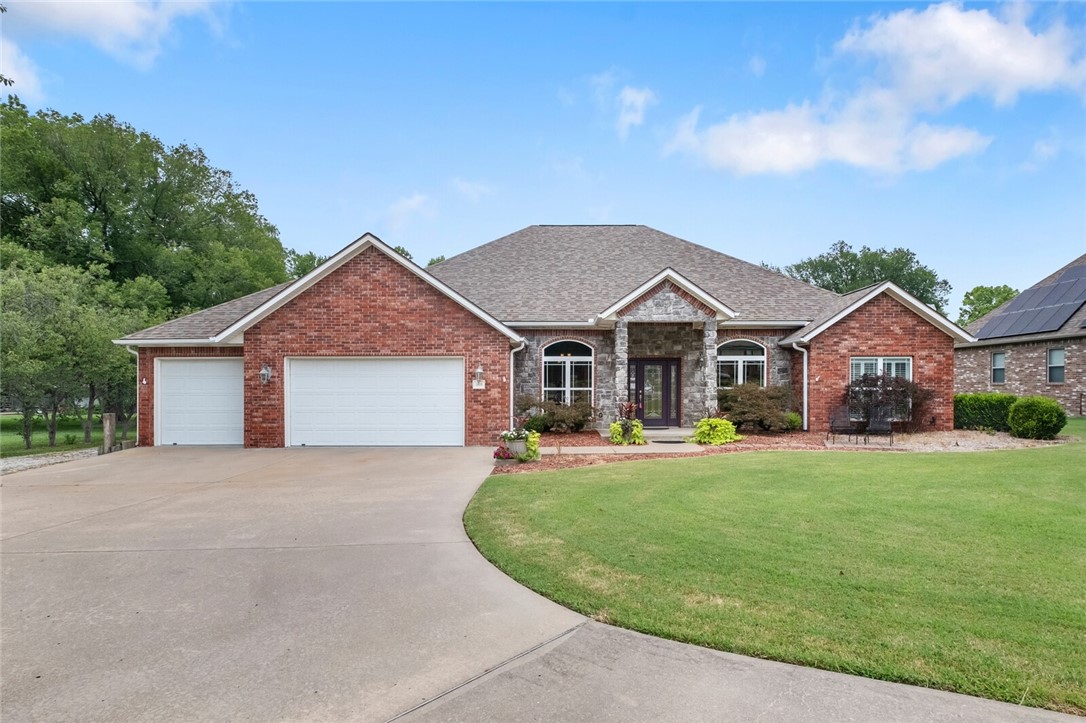 BEAUTIFUL HOME offering 1.5 AC(S) mol offering 4 BR/3 BA (split floorplan), formal dining, formal sitting area, office space, FP, college/in-law space option, edge of city limits, close to ALL conveniences located in Siloam/Downtown, JBU, schools, businesses, trails across the road at JBU. This property has a wet weather creek/back of the premises, some woods/privacy and some open/backyard! Replaced recently: water heater, added insulation (entire house closed foam cell blown insulation in walls/ceilings w/added loose fill in attic to equal near r60 value, very low energy bills), HVAC is conv. elect. cooling w/boost heating (not used or needed by seller), primary heat is NG hydronic radiant floor heating. Radiant floor heating is silent, draft free, extremely low maint., very efficient, radiating warmth from the floors upward where it's needed most. Domestic water heater is NG. City Services elect, water, trash & fire dept., Gas Black Hills Energy. Small man cave with elect. TOO MUCH TO MENTION! SEE IT TODAY!