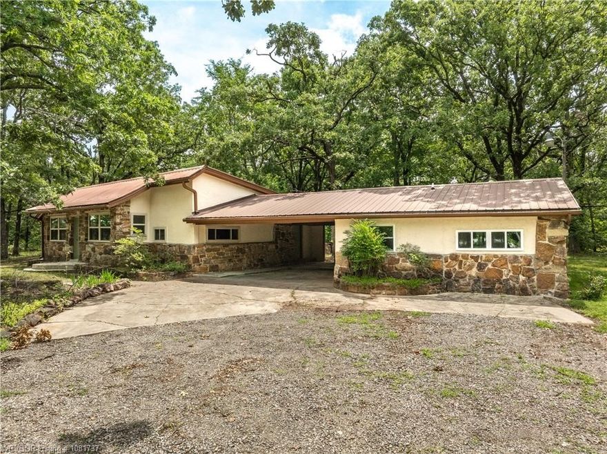 Fully Remodeled Mountainburg Gem with Guest Suite & Acreage! Welcome to this stunning 4-bedroom, 2-bathroom home in the heart of Mountainburg, Arkansas—completely renovated from the studs up! No detail was overlooked in bringing this home back to life, featuring brand-new electrical, plumbing, and modern finishes throughout. This unique property also includes a 500 sq. ft. detached mother-in-law suite with its own full bathroom—perfect for multi-generational living, guests, or rental income. Sitting on 2.44 Acres with two working wells on property, but hooked up to Mountainburg city water , and full camper hookups, it’s ideal for those looking for flexibility and self-sufficiency. Outside, you’ll find multiple outbuildings for storage, workshops, or homesteading needs, making this a true country dream. Whether you’re looking for your forever home, an investment, or a homesteader’s paradise, this property offers a rare blend of comfort and utility that’s hard to find in today’s market.