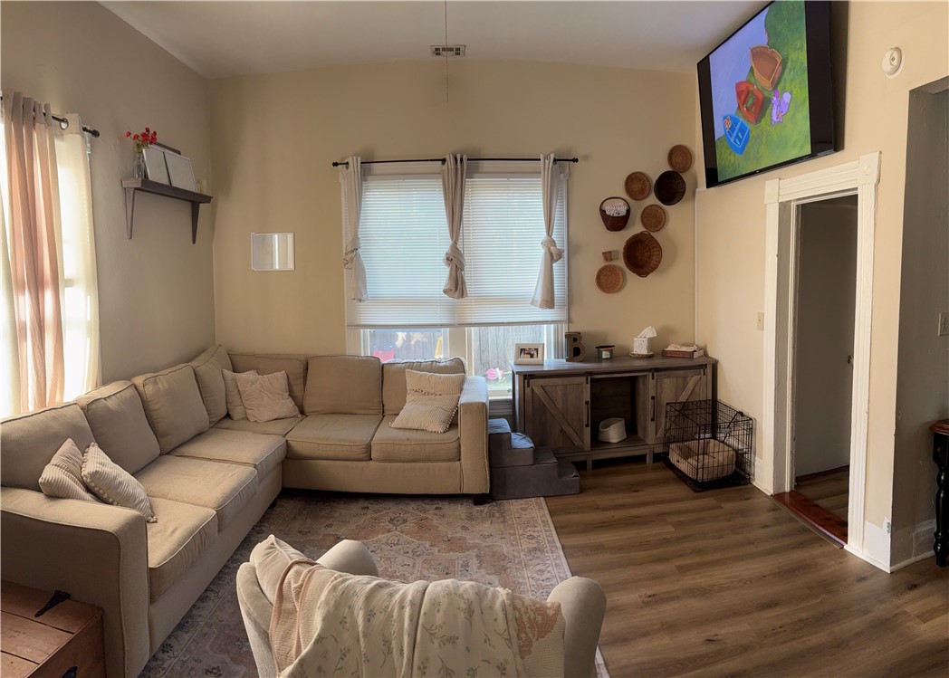 Perfect starter home or investment property. Exterior is an Ozark Architectural 'giraffe style' home. New roof in 2020. 3 bedrooms with 1.5 bathrooms. Walking distance to library and downtown. Sold as is. Owner is related to agent.