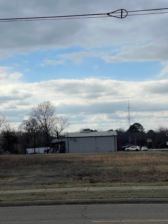Prime Commercial Lot in a Thriving Location!
Don’t miss this exceptional opportunity to own approximately one acre of commercial land in a high-growth area of town. Ideally positioned on a corner lot with excellent visibility and access, this property is just minutes from the interstate—perfect for attracting steady traffic and maximizing business exposure. Surrounded by established businesses and ongoing development, it’s an ideal site for retail, office, service industry, or investment use. Utilities nearby and zoning in place—ready for your vision!