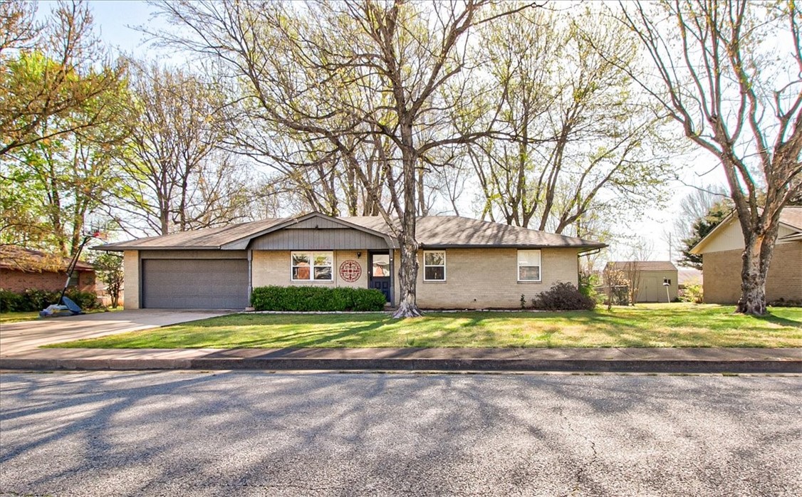 A great location for this cozy brick home that is ready for the next family to move in and love. As you open the door to your new home you have a nice formal living area to your left that could be used for many different things such as an office or flex room. Just ahead of you is another living area where current family likes to gather and watch TV or play games. Stroll past a nice dining area as you mosey over towards the kitchen with a laundry room just off kitchen. Three good sized bedrooms are on the other side of the home. Out back in fenced yard are several large mature trees that are perfect for the kids and animals to safely play. 2 car garage with some added storage completes this home. Call today to schedule for your new home!