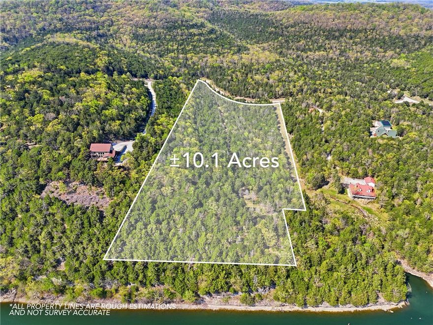 Tucked away in the peaceful Oaks Landing subdivision on Table Rock Lake, this 10-acre wooded tract offers privacy, natural beauty, and over 350 feet of lake frontage. A paved private road leads to the property, where a gravel drive is already in place and a path has been cleared, providing easy access through the land and down toward the water. The terrain features impressive rock outcrops, a bluff overlooking the lake, a seasonal creek, and multiple potential build sites for your custom lakeview home. Bordering Mark Twain National Forest to the north and Table Rock Lake to the south, this property offers a rare blend of seclusion and accessibility. Enjoy access to a private subdivision swim/fishing dock, along with abundant wildlife and mature hardwoods throughout. Located just 30 minutes from Eureka Springs and about an hour to Branson or Northwest Arkansas. Come explore the possibilities this unique property has to offer!