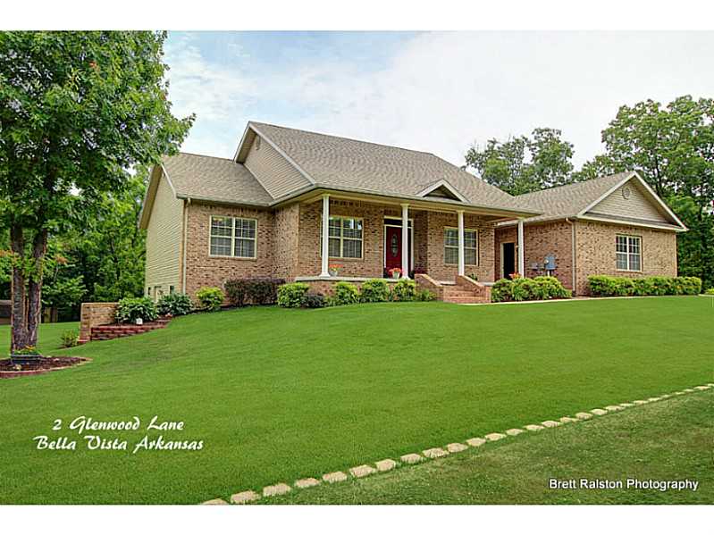 Lots of Love has been poured into the up keep of this wonderful home & the .6 acres of beautifully manicured yard w/raised beds for gardening. The 924 sqft. workshop & storage in walkout basement is any man's dream! Screened porch, attached home generator,handicap accessible doors & bath, over sized 3 car garage, large laundry room, irrigation system, 9 & 10' ceilings, i-beam construction are just a few of the amenities this lovely home offers the new buyer.
