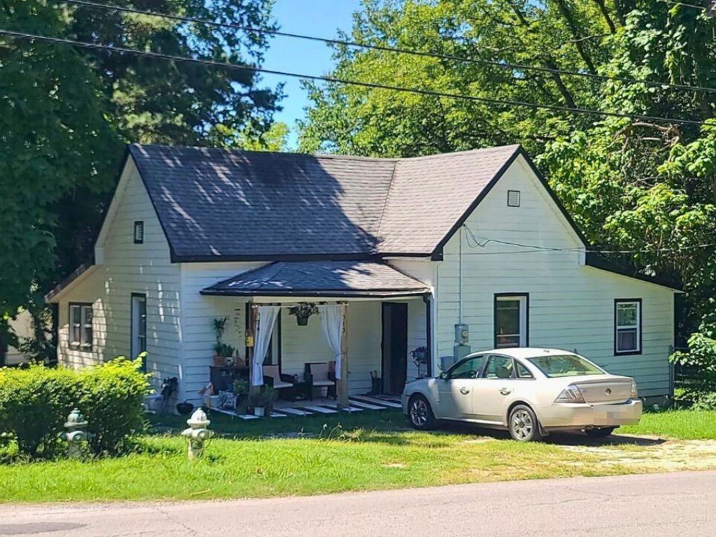 So much potential in this traditional frame home on a beautiful level corner lot with mature shade trees! Updates completed in 2020 included exterior siding, windows, and plumbing. Inside, thereās vinyl plank flooring throughout, along with a kitchen that offers a butcher block island and stainless appliances, all opening into a main living area with tall ceilings. With 3 bedrooms, 1.5 bathsāincluding a convenient half bath off the generously sized laundry space, this property is ready for your personal vision and some TLC to bring it back to life. Outside, the fenced backyard provides plenty of space, while the front porch is ready to be refreshed into something truly charming. The yard holds lots of opportunity tooāall just minutes from Historic Downtown Prairie Grove and community amenities like the City Water Park and splash pad, dog park, skate park, and Battlefield State Park. Seller is eager to make a move, so bring your ideas and make this one your own! SOLD AS IS.