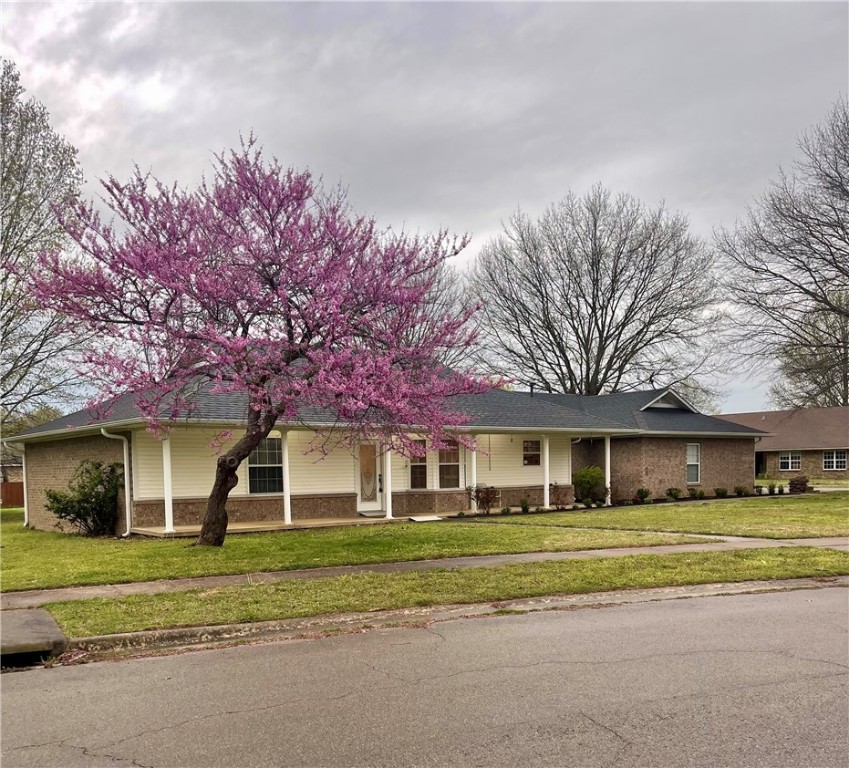 This is a very well-maintained home! 1,946 SF, 3 BR, 2 BA, 2 car garage, fantastic sunroom, and lots of storage. There is even a workshop off the garage. Home sits on a great corner lot. Heat/Air and roof replaced 2 years ago. The adjoining lot is available for purchase