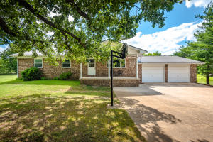 Immaculate and well-kept home ready to move in! Since home was built it has had a new heat pump, metal roof, windows, wood floors, concrete siding & patio door. Brand new dishwasher being installed. Half of basement is finished into a den and the other half is workshop with an oversized walk-out door. Fruit trees, garden area, lots of trees for privacy. Possible circle drive could be made to exit onto Terrapin Creek Rd. Sq ft per assessor.