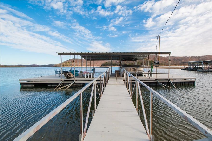 One of the best private docks on the lake!  You can drive right down to the dock and enjoy the 2 swim decks.  House was extensively renovated and basement was  finished this year. Home sits on 2 lots, features 2" tongue and groove ceiling and has a back up generator.  Pontoon Boat on lift can convey with home and furniture is negotiable.  Listing Agent is related to Seller.