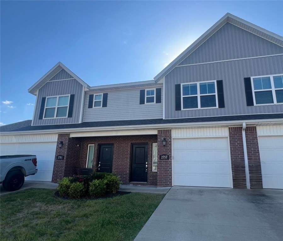3 BED/2.5 BATH condo in prime Rogers location with convenient access to major shopping centers,the city center, and I49. Don’t miss the chance to own a unit in this multi-family fourplex. The property includes a private 1-car garage, refrigerator, washer and dryer, granite countertops, walk-in closets, and ceiling fans throughout. It's an excellent opportunity for first-time homebuyers, corporate commuters, or investors. Photos shown are representative of the unit's style, features and layout. Individual unit fixtures, colors and finishes may vary slightly.