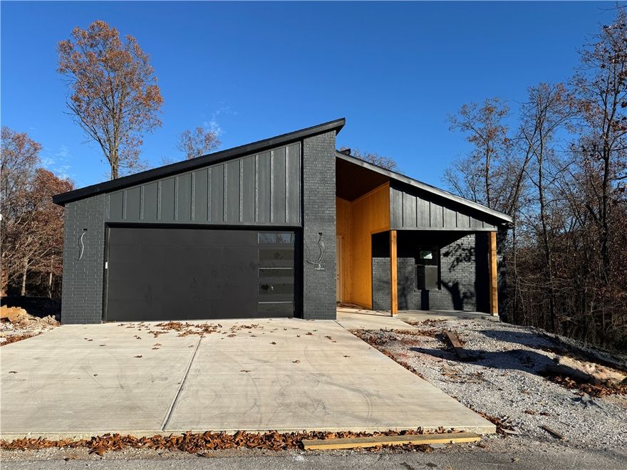 Brand-new Bella Vista construction—level front & back yard! Stand-out curb appeal with brick exterior & natural wood entry (car siding)! Located steps from Homestead Taylor trail & near the Back Forty, it’s perfect for outdoor enthusiasts—but also ideal for quiet mornings on the deck or leisurely evening strolls. Inside this inviting new 3-bed, 2-bath home, enjoy a bright, open layout with luxury vinyl plank flooring, quartz countertops, stainless steel appliances, walk-in pantry, laundry room, cozy dining nook, walk-in closet, & a covered deck—a pleasant space to relax or entertain. Designer lighting elevates everyday living. Energy-efficient features include recirculating hot water system & a 2-year builder warranty. Use preferred lender & receive $3,500 for closing costs, prepaids, or a rate buy-down. Contact Donna Winn to explore more options from this highly rated builder. Photos are from a prior build by the same builder with the same layout and similar finishes.